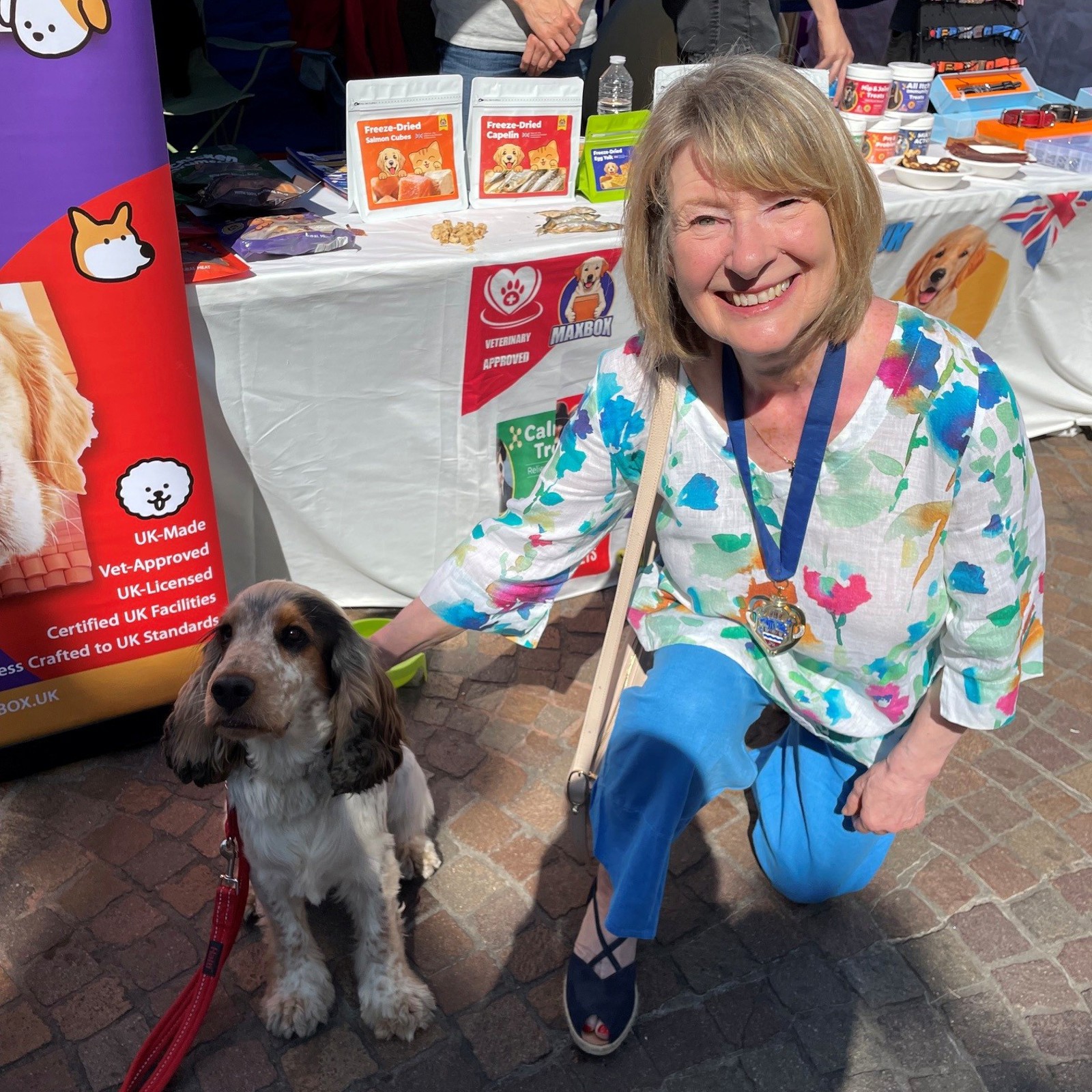 Cllr Sarah Slack With One Of The Furry Visitors, At Maxbox Stall